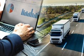 فردی در حال مشاهده نمودار ستونی پشت لپ‌تاپ- بهینه سازی ناوگان